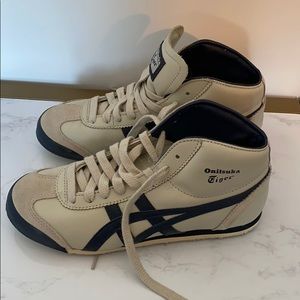 Brand new never worn tiger sneakers.